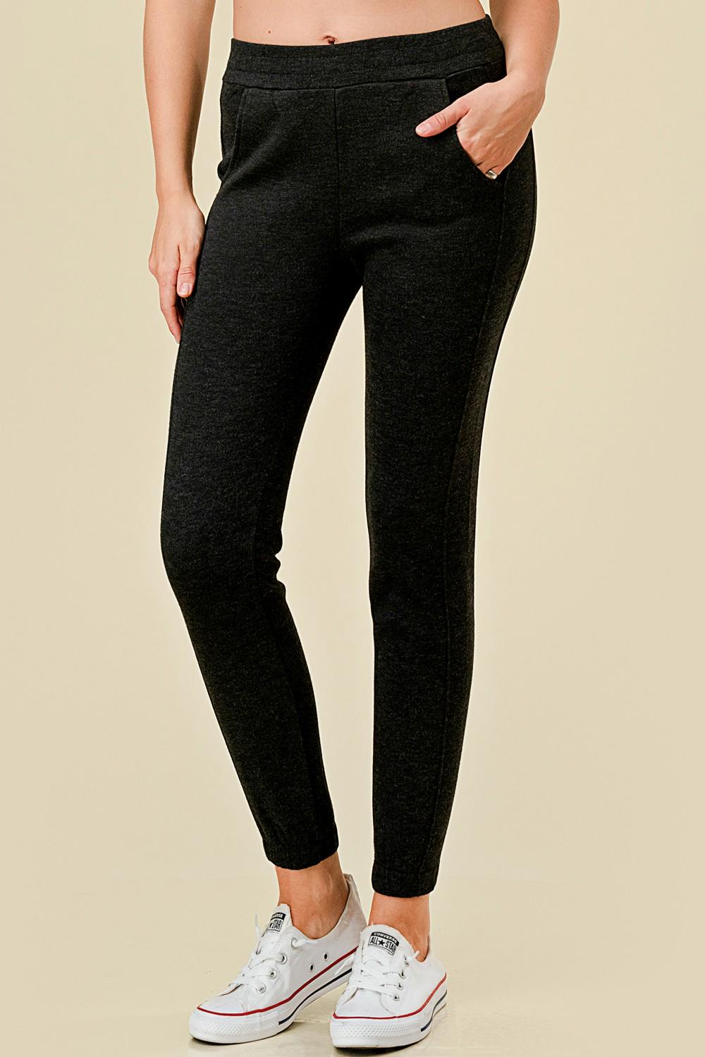 Women’s fleece lined black jogger sweatpants with side pockets, and slim tapered ankle fit