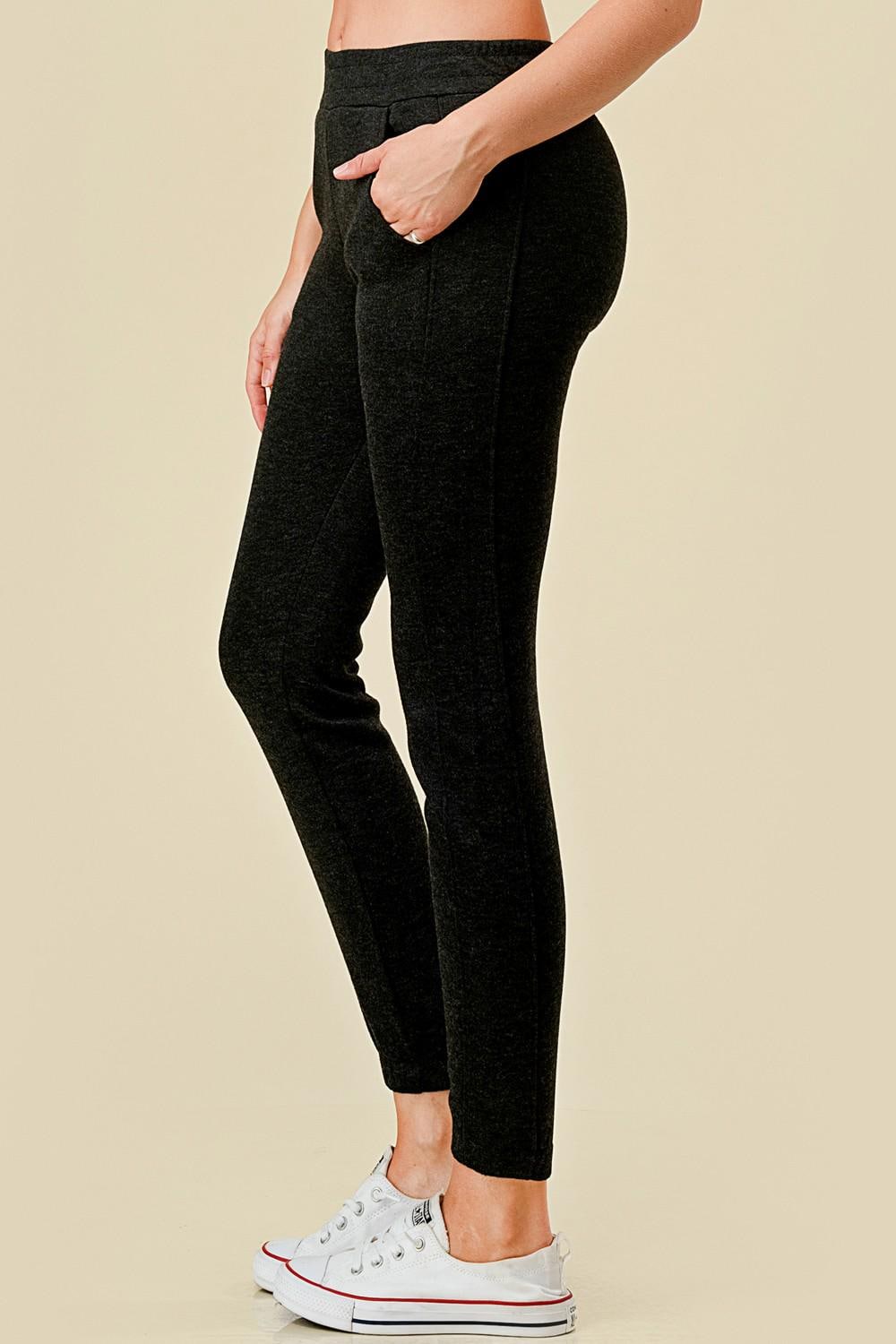 Women’s fleece lined black jogger sweatpants with side pockets, and slim tapered ankle fit